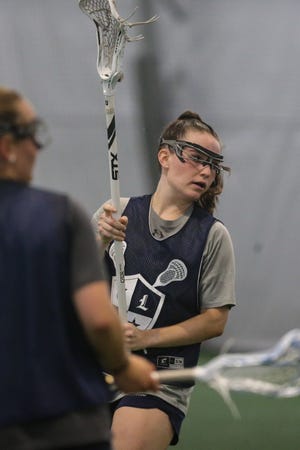 Kate Balicki, of Wayland, defends during league play at Compete Indoor Sports in Norwood on Jul.y 28, 2021.