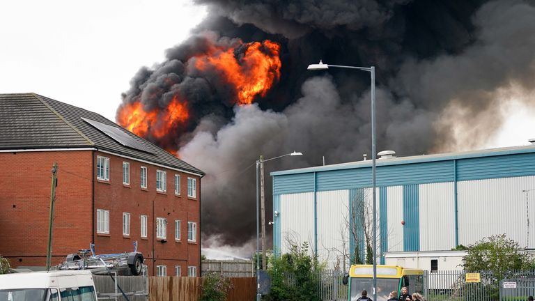 A large fire at an industrial estate has prompted the evacuation of surrounding properties as it is feared the blaze may involve chemicals.